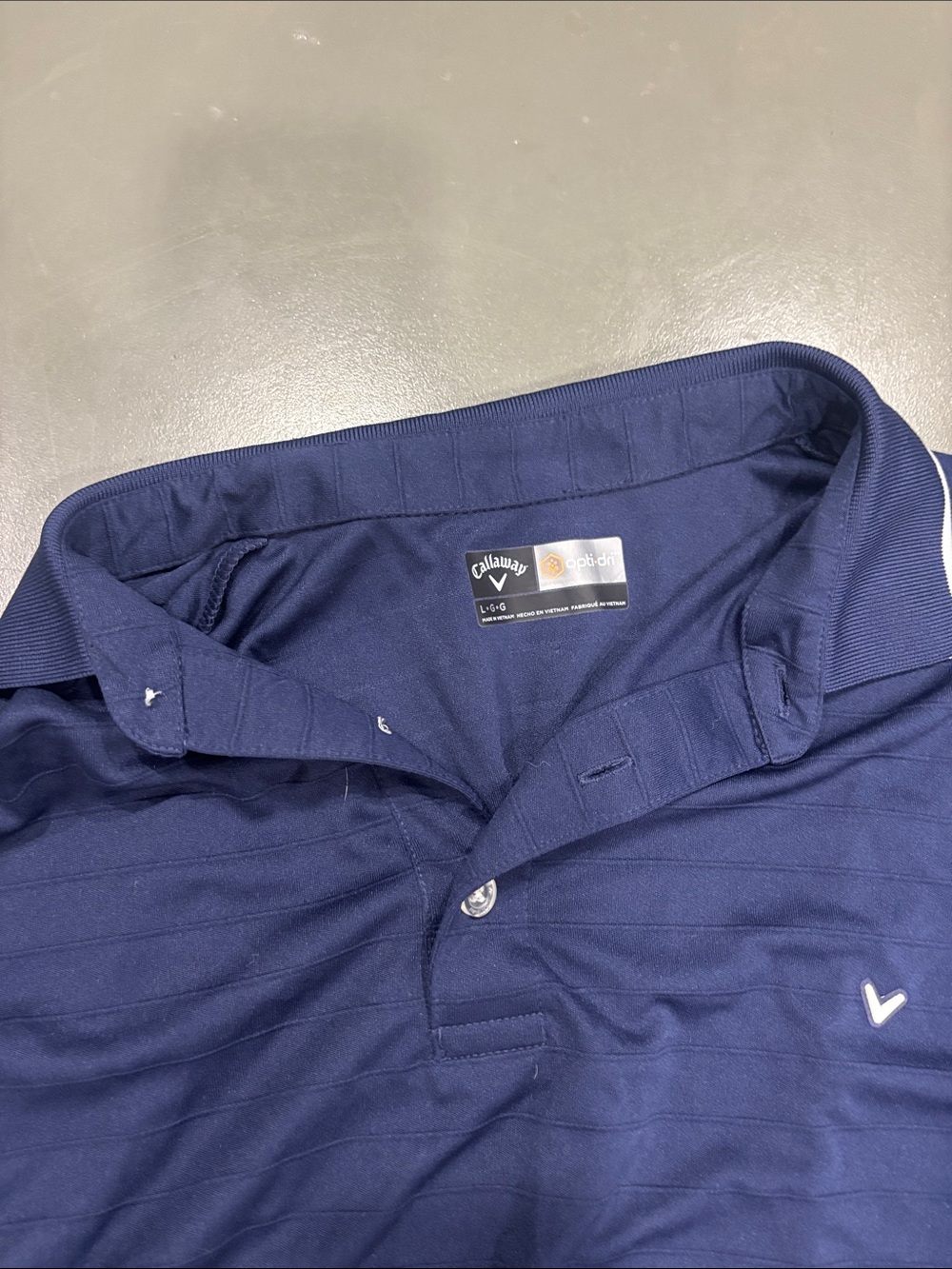 NWT…Callaway Men's Navy Polo with Subtle Stripe Texture